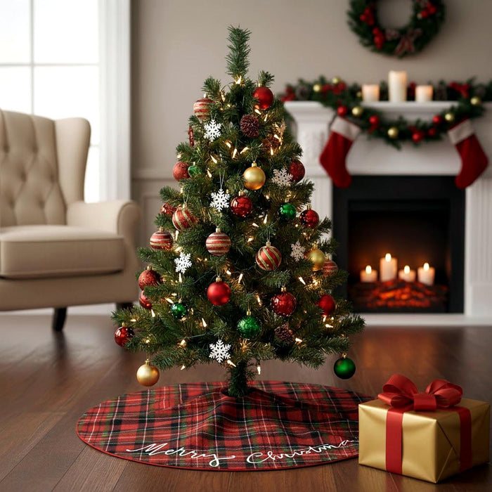 Merry Christmas tree skirt on a Stewart plaid red green