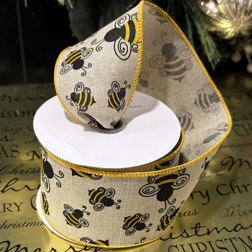 Black and yellow bumble bee ribbon on a linen base with stiched wired edge