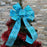 Blue white snowflake bow as a Christmas tree topper