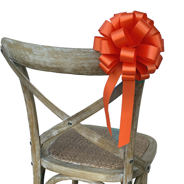 orange pull bows for wedding chairs