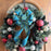 Peacock Theme Bow on a  Christmas Wreath