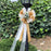 gold-and-ivory-wedding-bows-with-tulle-tails-and-rosebuds