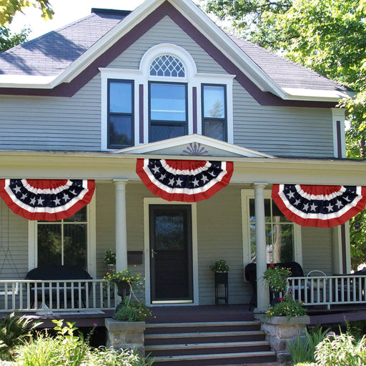 classic red white and blue buntings adorning  quintessential souther porch